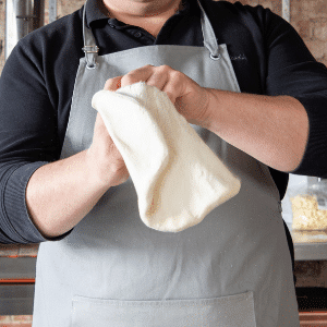 1 super easy way to stretch pizza dough by hand